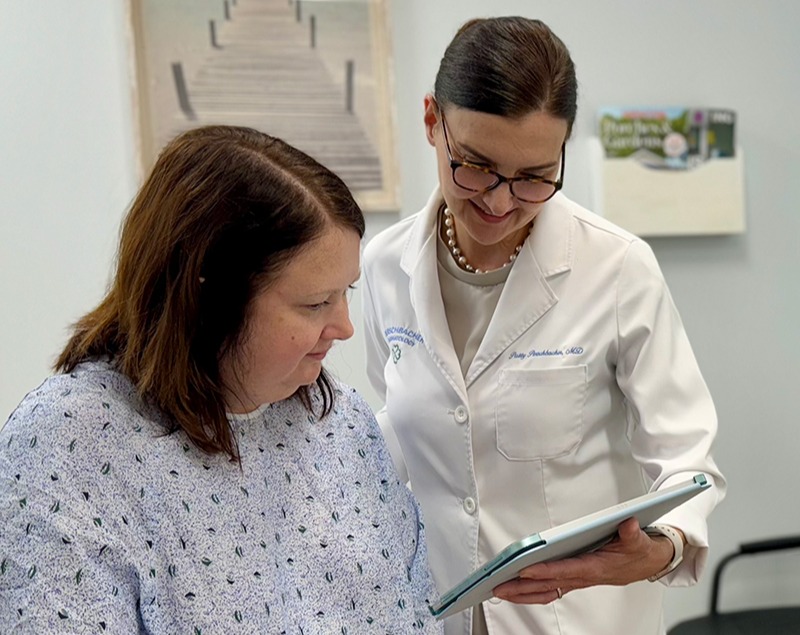 Dr-Perschbacher-examining-patient